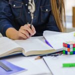 crop-woman-studying-table